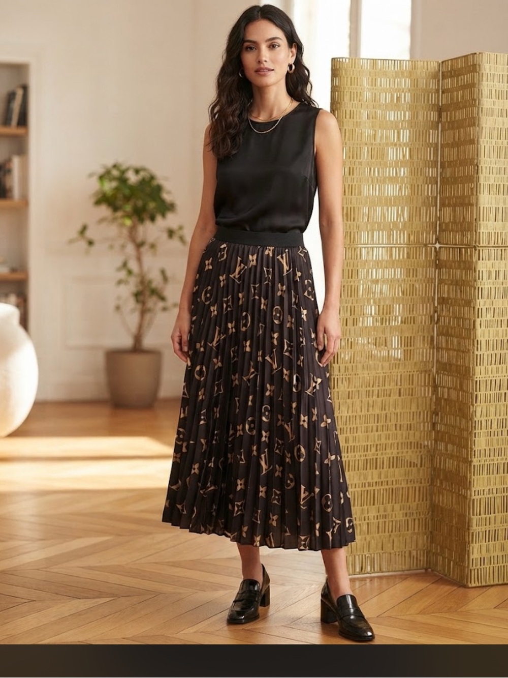 Pleated Black Midi Skirt with Gold Monogram Pattern